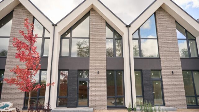 Fronts of modern houses lined up to each other